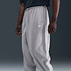 Pants deportivos de tejido Knit oversized para hombre Nike Sportswear Club