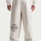 Nike Solo Swoosh fleecebroek met boorden voor heren