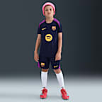 FC Barcelona Strike Nike Dri-FIT rövid ujjú futballfelső nagyobb gyerekeknek