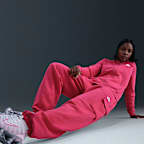 Pants de entrenamiento cargo oversized de tiro medio para mujer Nike Sportswear Club Fleece