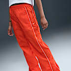 Pants con dobladillo abierto de tejido Woven de tiro alto para mujer Nike Windrunner