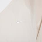 Playera de manga larga de tejido Woven de cuello en V holgada para mujer Nike Sportswear Essential