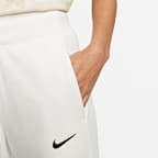 Pants de entrenamiento de tiro alto y piernas anchas para mujer Nike Sportswear Phoenix Fleece