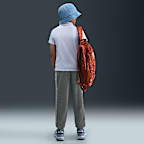 Kalhoty Nike Sportswear Club Dri-FIT pro větší děti