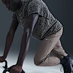 Mångsidiga byxor Nike Form Dri-FIT i avsmalnande modell för män