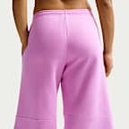 Pantalones entubados de tiro medio holgados para mujer Nike Sportswear Phoenix Fleece