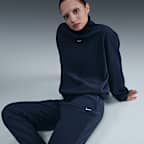 Pants de tejido Fleece de tiro medio cómodos para mujer Nike Sportswear Phoenix Plush