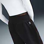 Pantaloni oversize a vita alta Nike Football Tottenham Hotspur Phoenix Fleece – Donna