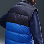 Ανδρικό αμάνικο μπουφάν Statement με πούπουλα Nike Windrunner