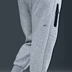 Joggingbyxor Nike Sportswear Tech Fleece med mellanhög midja för kvinnor (Plus Size)