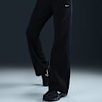 Maskinstrikkede Nike Sportswear Windrunner-bukser med mellemhøj talje og slank pasform til kvinder