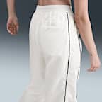 Pants con dobladillo abierto de tejido Woven de tiro alto para mujer Nike Windrunner