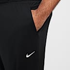 Pants Dri-FIT versátiles con dobladillo abierto para hombre Nike Totality
