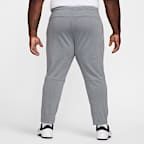 Pants de alto rendimiento Dri-FIT de pierna entallada con protección UV para hombre Nike Primary Fleece