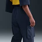 Pants cargo de tiro medio para mujer Nike Sportswear Everything Wovens