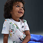 Conjunto de playera y pants Reveal estampado infantil Nike Sportswear