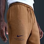 Pants de tejido Fleece con puños para hombre Nike Sportswear Club