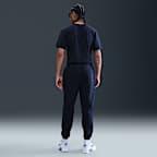 Pánské kalhoty Nike Club z česaného flísu s manžetami