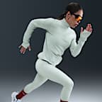 Haut de running deuxième couche Dri-FIT à 1/4 de zip Nike Trail pour femme