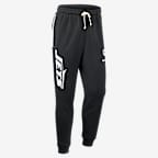 Pants Nike Dri-FIT de la NFL de pierna entallada para hombre New York Jets Ground Game Sideline - Negro