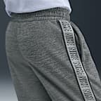 Kalhoty Nike Sportswear Club Dri-FIT pro větší děti