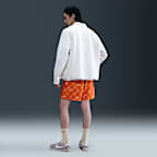 กางเกงขาสั้น Flow ผู้ชายแบบทอ Nike Sportswear Club