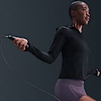 Playera de manga larga Dri-FIT de ajuste slim con gorro para mujer Nike Universa