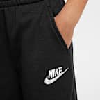 Pants de tejido Fleece de pierna ancha para niños talla pequeña Nike Sportswear Club