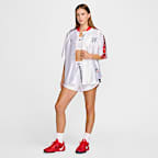 Playera de básquetbol Nike de temporada para mujer USA Village