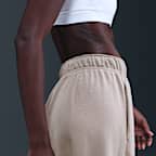 Pants de entrenamiento oversized de tiro medio para mujer Nike Sportswear Club Fleece