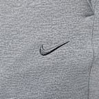 Pants de alto rendimiento Dri-FIT de pierna entallada con protección UV para hombre Nike Primary Fleece