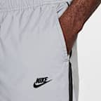 Pants de tejido Woven con diseño reflejante para hombre Nike Tech