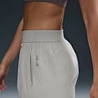 Pants Dri-FIT de tiro alto de pierna holgada y amplia para mujer Nike 24.7 PerfectStretch