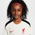 Liverpool F.C. Strike Special Edition Older Kids' Nike Dri-FIT Football Short-Sleeve Knit Top
