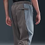 Pants de tejido Woven Dri-FIT de colores contrastantes oversized para hombre Nike Tech