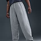 Fleecebyxor med muddar Nike Solo Swoosh för män