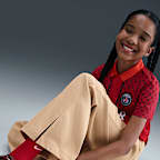 Vävda byxor med vida ben Nike Sportswear för ungdom (tjejer)