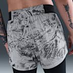 Shorts de correr con diseño reflejante de tiro medio 2 en 1 para mujer Nike Swift
