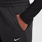Spodnie z tkaniny z szerokimi nogawkami dla dużych dzieci (dziewcząt) Nike Sportswear
