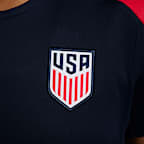 Playera de fútbol de manga corta de tejido Knit Nike Dri-FIT de la selección nacional masculina de Estados Unidos Strike para mujer