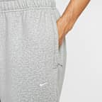 ナイキ ソロ スウッシュ メンズ フリース オープンヘム パンツ