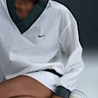 Nike Sportswear Essential Women's Loose UV Woven Long-Sleeve V-Neck Top