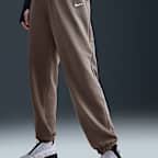 Pants de entrenamiento de French Terry oversized de tiro alto para mujer Nike Sportswear Phoenix Fleece