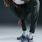 Pants de entrenamiento de tiro medio para mujer Nike Sportswear Phoenix Fleece