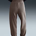 Pants de entrenamiento de French Terry oversized de tiro alto para mujer Nike Sportswear Phoenix Fleece