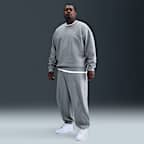 Fleecebyxor med muddar Nike Solo Swoosh för män