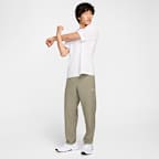 Pants Dri-FIT versátiles con dobladillo abierto para hombre Nike Form