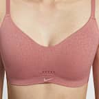 สปอร์ตบราผู้หญิงซัพพอร์ตระดับต่ำเสริมฟองน้ำดีไซน์ปรับเปลี่ยนได้ Nike Alate Minimalist