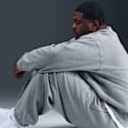 Fleecebyxor med muddar Nike Solo Swoosh för män