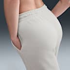 Pants de tiro alto de pierna amplia para mujer Nike Sportswear Phoenix Fleece